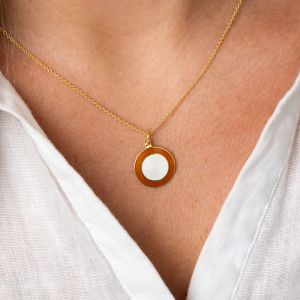 Necklace. Nora Gulbrandsen, ruby red and white enamel with gilded silver